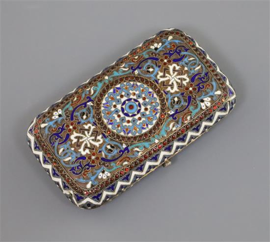 A late 19th century Russian 88 zolotnik silver and polychrome cloisonne enamel cigarette case by A. Ovchinnikov, gross 120 grams.